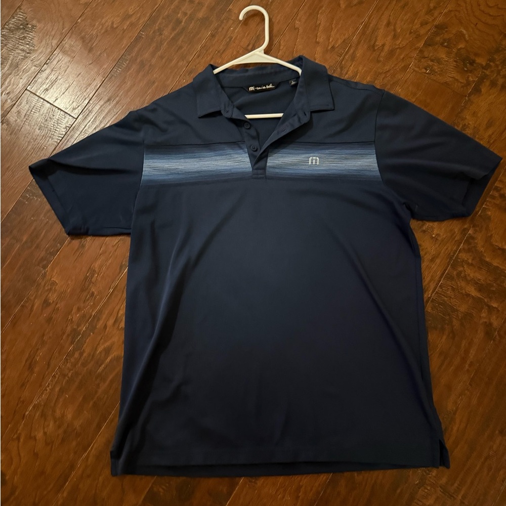 Travis Mathew Navy Polo with Horizontal Stripe Chest Detail